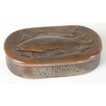 A Newlyn Copper snuff box of oval design with riveted hinged lid decorated with fish wrack, Bears W.