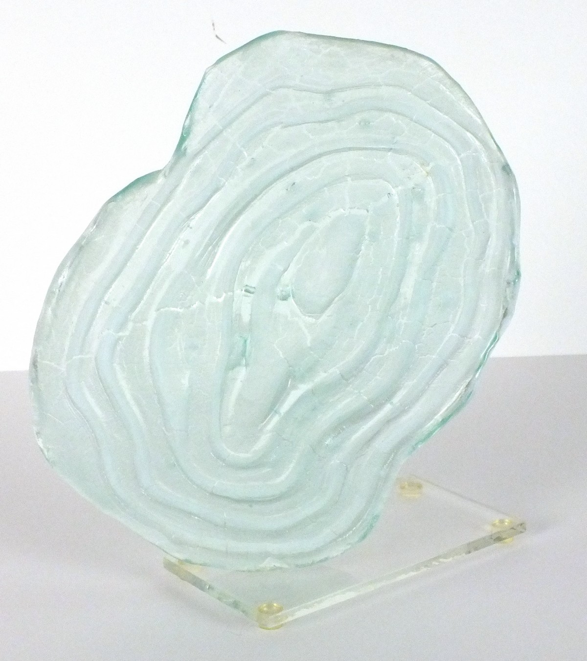 Lydia SPURRIER-DAWES (b.1961), Glass Sculpture on glass base 'Pool', 10" high (25.4cm)