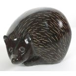 Lawrence MURLEY (b.1962), A sculpture in Red Serpentine of a 'Hedgehog', Numbered II, Signed LM to