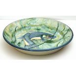 Adrian J. BROUGH (b.1962), An earthenware Platter interior decorated a fish amidst weed, Signed