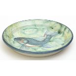 Adrian J. BROUGH (b.1962), An earthenware shallow Platter decorated a fish on a green swirl