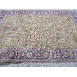 Small meshed style carpet with buffed background and blue border 8'6” x 6'