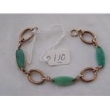 A green stone 9ct panel bracelet 7” long 7g