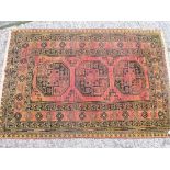 Red ground Belouche rug 4'9” x 3'2”