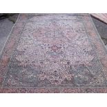 An Oriental carpet with medallion to centre 9' x 6'3”