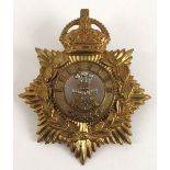 Edward VII Leinster Regiment blue cloth helmet plate. A brass other ranks badge with white metal