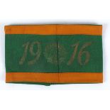 1916 Veteran's armband. A green and orange silk poplin armband with 1916" printed in gilt, made by