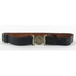 1920s Garda uniform belt and whistle A black leather belt with white metal two-piece buckle