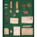 A collection medals, badges and ephemera relating to W. McGowan. Includes Great War and Victory