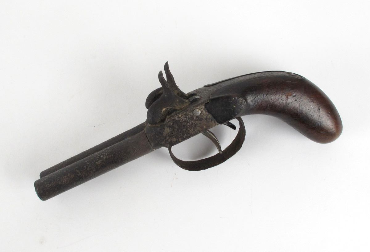 Early 19th century, double-barrelled percussion pistol. A pocket pistol, the hammers mounted to