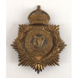 Edward VII Connaught Rangers blue-cloth helmet-plate. A Brass other ranks helmet plate. 5 x