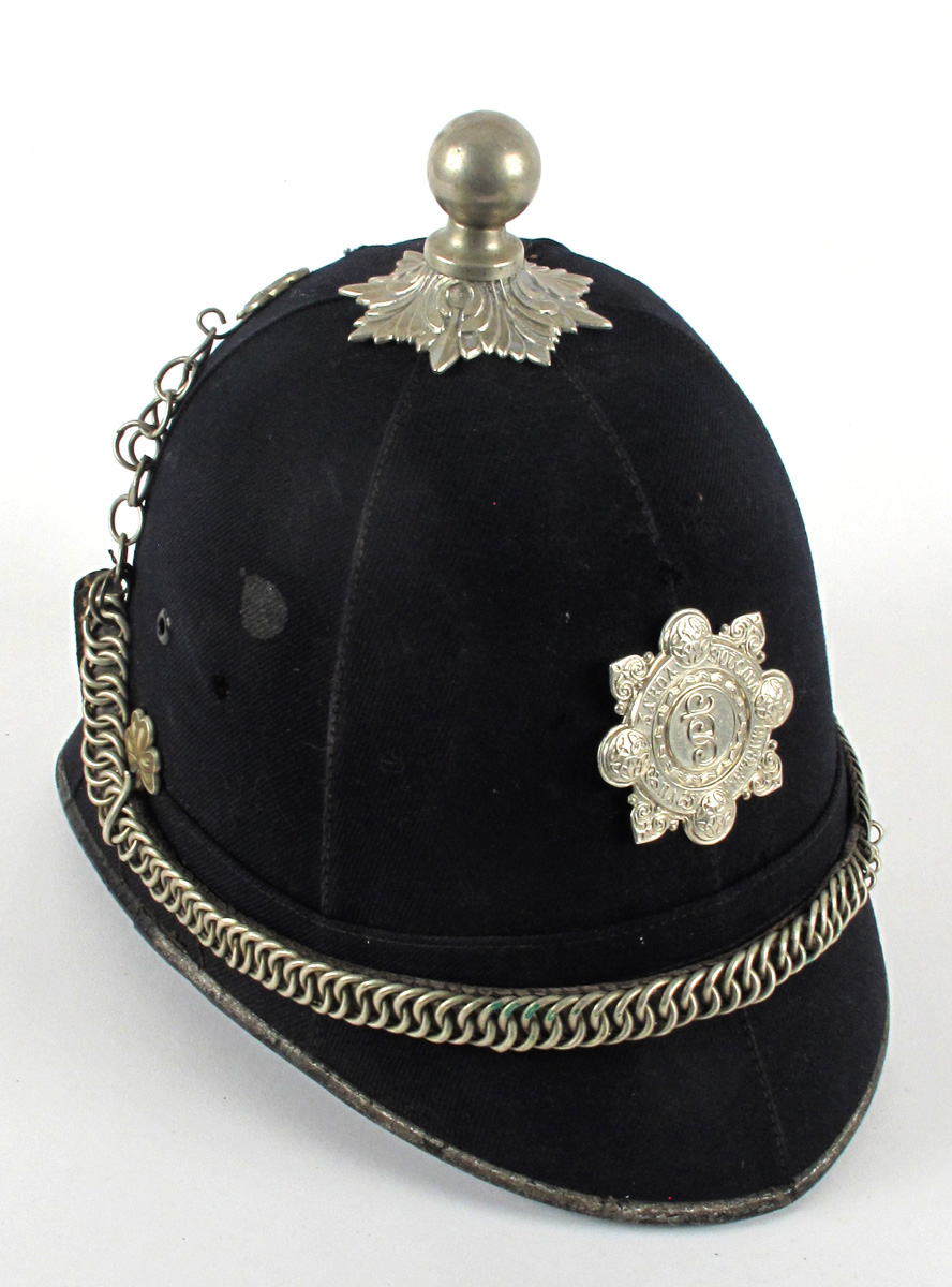 Late 1920s Garda Siochana helmet. Cloth helmet with white metal chain-link chinstrap, the rose