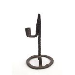 Late 18th century / early 19th century Irish wrought iron rush light. With typical duck-bill shaped,