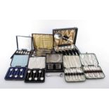 A large collection of cased silver flatware Comprising a set of twelve silver coffee spoons,