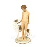 1930s Bavarian porcelain Art Deco figural group. A polychrome group of a nude young woman and a dog.