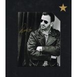 Ringo Starr signed photograph A black and white 10 x 8" photograph of Ringo Starr, signed in gold