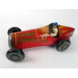 1950s Mettoy 'Giant' clockwork tin plate racing car A clockwork open top racer with tapering, red