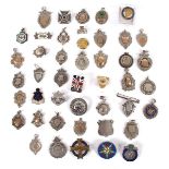 Sports, a collection of silver and other medals and badges. 28 miscellaneous hallmarked silver