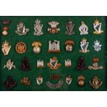 Early 20th century, Irish regimental badges collection. A framed collection of 30 badges of Irish