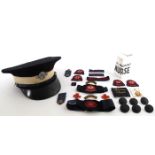 Red Cross uniform and badges and a St. John's Ambulance cap. A large collection of uniform items and