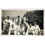 Brendan Behan, a photograph with a group of painters and decorators. A black and white