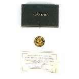 A cased 2 ounce 22-carat gold commemorative medal designed by Paul Vincze. A 2 ounce 22-carat gold