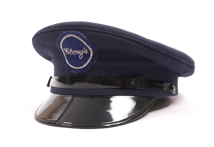 1960s Clery's Department Store, doorman's uniform cap. A navy visor cap with circular navy and