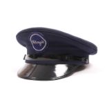 1960s Clery's Department Store, doorman's uniform cap. A navy visor cap with circular navy and