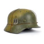 1939-1945 German Third Reich, M40 single decal SS helmet. Two-tone spray camouflage and baling wire,