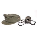 1939-1945 German Third Reich, Gebirgsjager M43 field cap and ski goggles. Dated 1944, size 57, the