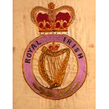 Early 20th century, Royal Irish Regiment, needlework panel. A linen panel with silk embroidered