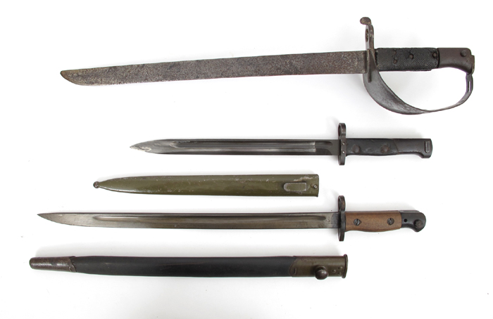 1858 pattern British Navel cutlass bayonet and two Lee Enfield bayonets. (3) The cutlass bayonet