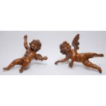 Victorian cherubs A pair of 19th century carved fruitwood cherubs. Collection of George and Maura