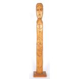 Markey Robinson (1918-1999) FIGURE WITH FRUIT wood carving inscribed with artists name [Markey] on