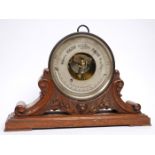 A Victorian Irish barometer. The drum shaped brass cased barometer by Yeates & Co., Dublin, on