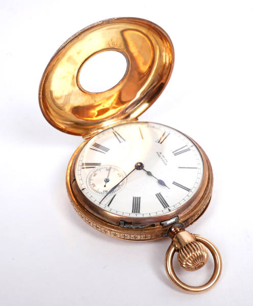 Early 20th century gold pocket watch. A gold cased Waltham half-hunter pocket watch, 6s-size