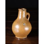 A Small 18th Century Rheinish Saltglazed Stoneware Flagon, 5 ins (13 cms) in height.