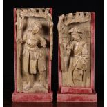 A Pair of 16th Century Antwerp Retable Fragments: One carved with the figure of a guard with