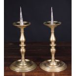 A Pair of Early 17th Century French Gilded Bronze Pricket Sticks.