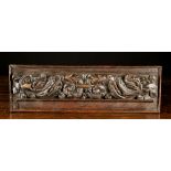 A Fine Cedarwood Panel carved with two dragons;