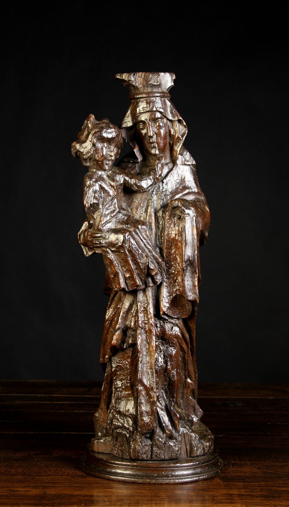 A Charming 15th/16th Century Carving of Crowned Madonna & Child with hollowed back,