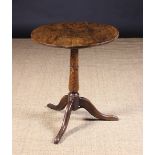 A George III Oak & Ash Tilt-top Tripod Table.