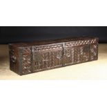 An Early 16th Century English Boarded Oak Chest/Coffer bound in studded iron straps with iron