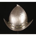 A Renaissance Style Cabasset Helmet with panels of etched decoration.