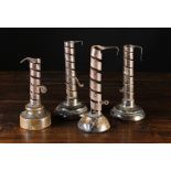A Collection of Four Late 18th/Early 19th Century Wrought Iron Spiral Candlesticks with treen bases
