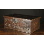 A 17th Century Boarded Oak Desk Box of rectangular form.