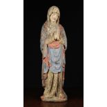 A 15th Century Flemish Polychromed Wood Carving of a Female Saint depicted wearing a white head