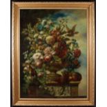 A Large & Impressive Oil on Canvas: Still Life depicting an urn cascading flowers on a classical