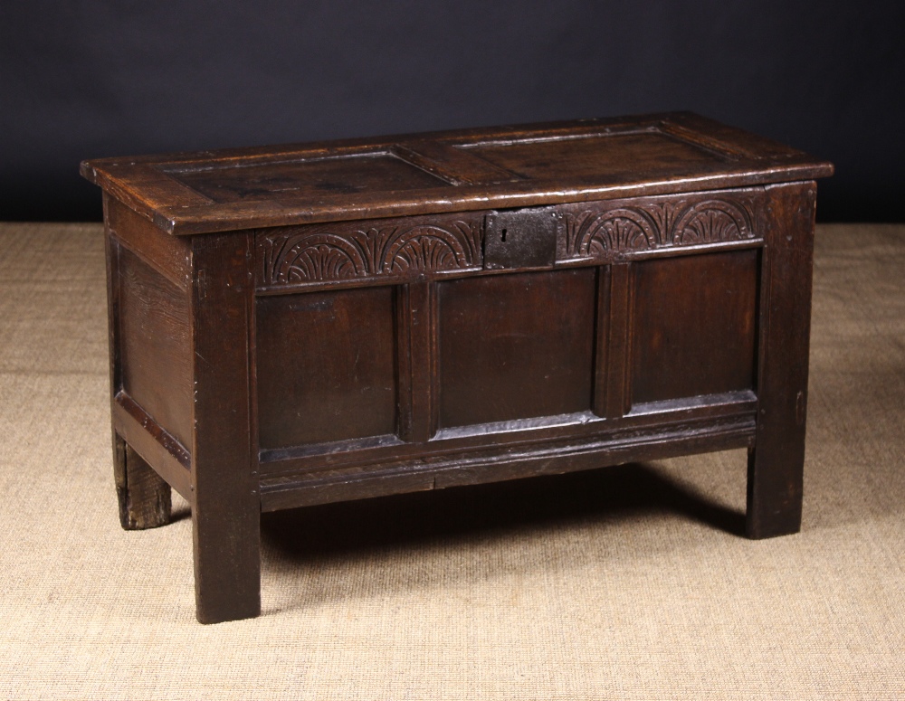 A Small 17th Century Panelled Oak Coffer.