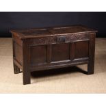 A Small 17th Century Panelled Oak Coffer.